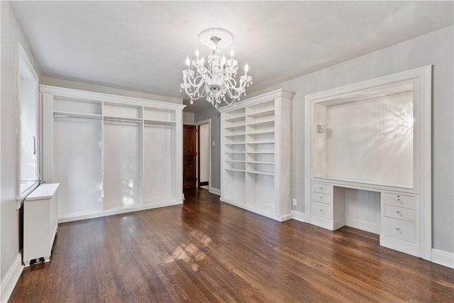 705 E Beau St E, Washington Boro, PA 15301 - unfurnished bedroom with a chandelier, wood finished floors, a closet, and built in desk