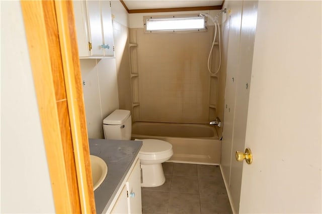 full bathroom with tile patterned flooring, toilet, vanity, and tiled shower / bath