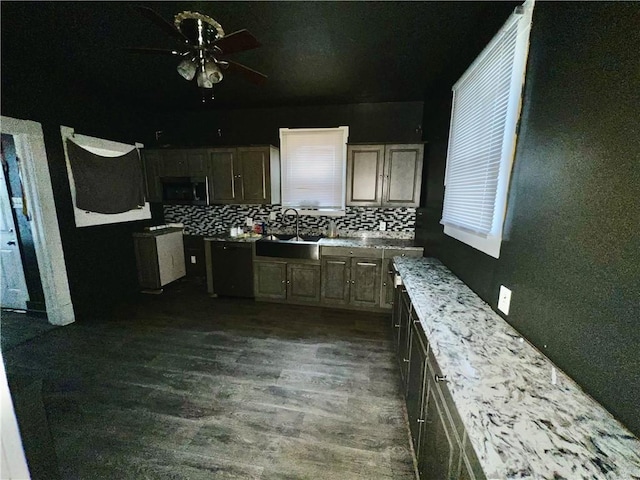 kitchen with dark hardwood / wood-style floors, ceiling fan, sink, and backsplash