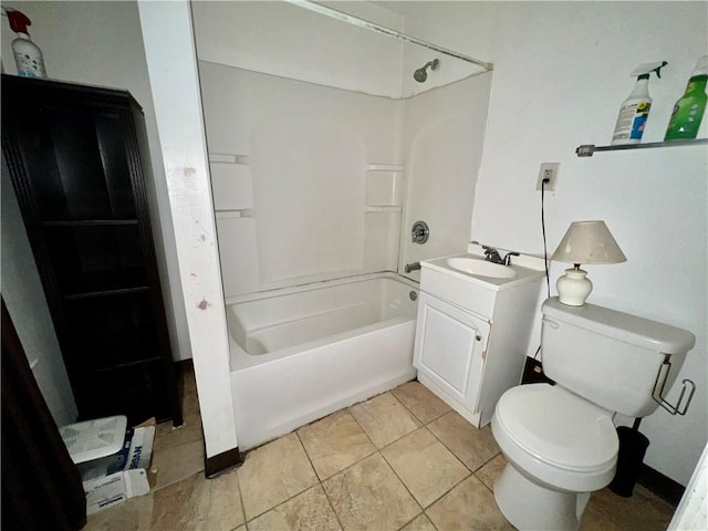 full bathroom with washtub / shower combination, tile patterned floors, vanity, and toilet