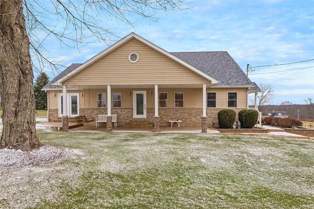 view of front of home with a front yard