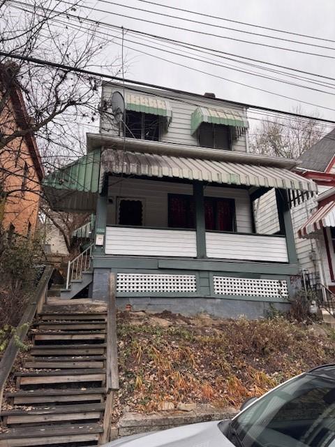 view of front facade featuring covered porch