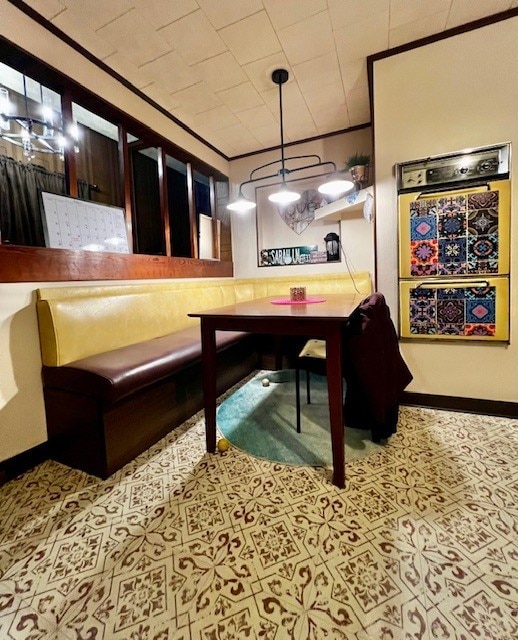 dining room featuring ornamental molding