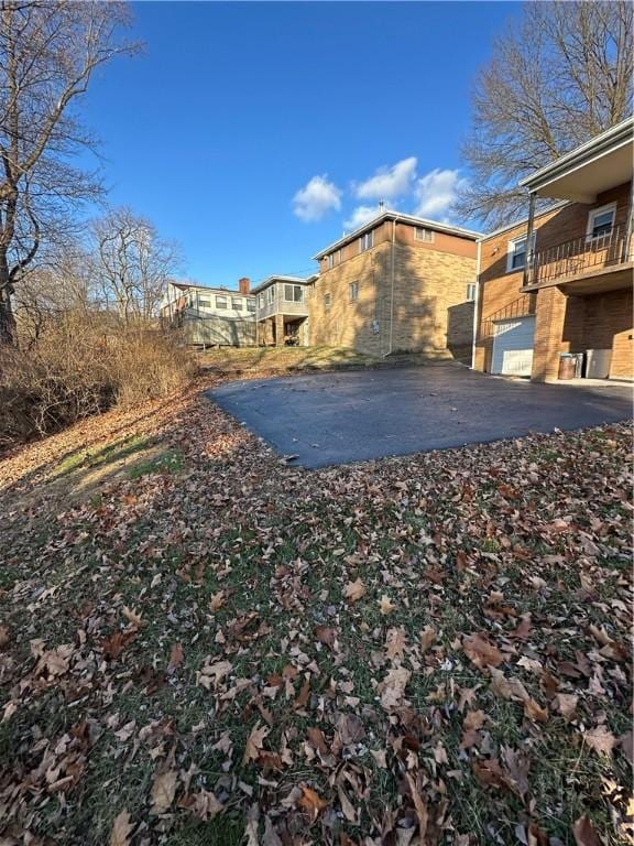 view of side of home featuring a patio area