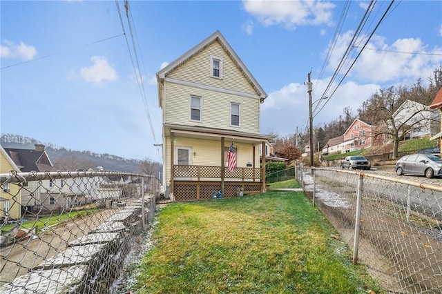 view of front of home with a front yard