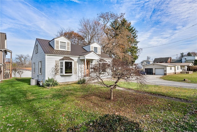 new england style home featuring a front yard, a garage, and central air condition unit