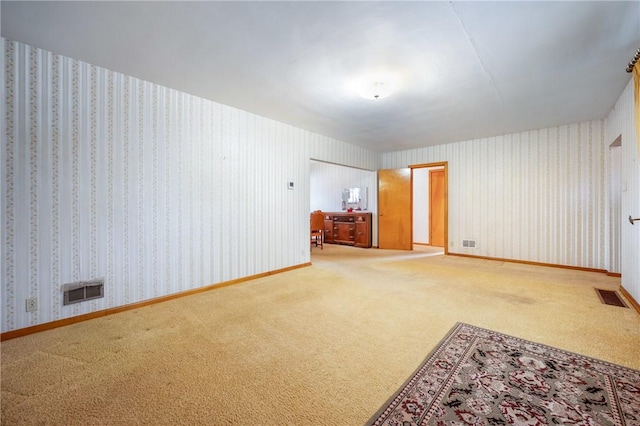 spare room with carpet