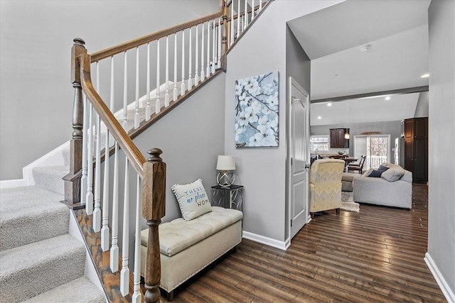 stairs with wood-type flooring