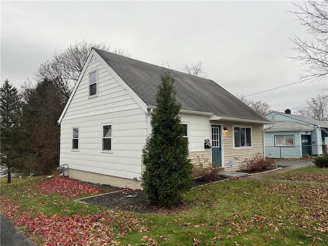 exterior space featuring a front lawn