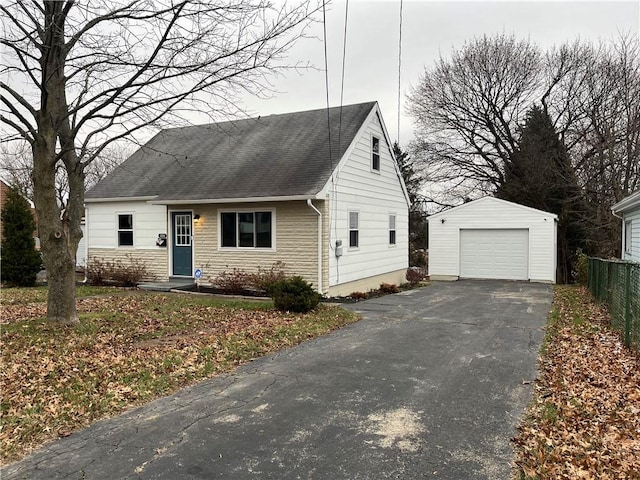 view of front of home featuring an outbuilding and a garage