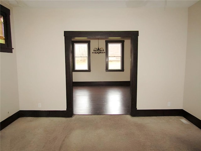 empty room featuring hardwood / wood-style flooring