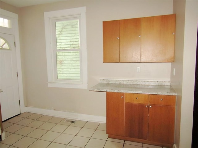 kitchen featuring light tile patterned floors