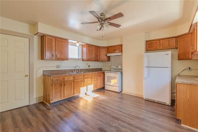 571 Kaylor Frogtown Rd, Bradys Bend Twp, PA 16025 - kitchen featuring white appliances, ceiling fan, under cabinet range hood, brown cabinets, and dark wood-style floors