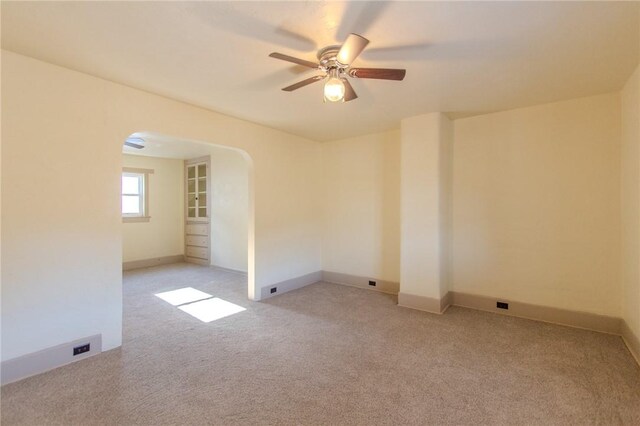 571 Kaylor Frogtown Rd, Bradys Bend Twp, PA 16025 - unfurnished room featuring arched walkways, a ceiling fan, and light carpet