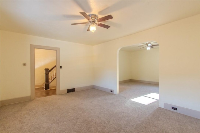 571 Kaylor Frogtown Rd, Bradys Bend Twp, PA 16025 - empty room featuring ceiling fan, light carpet, and arched walkways