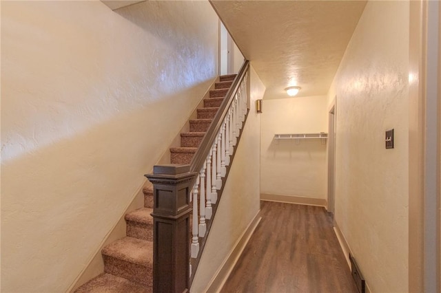 571 Kaylor Frogtown Rd, Bradys Bend Twp, PA 16025 - stairway featuring wood finished floors and a textured wall