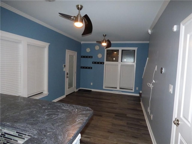 bedroom featuring crown molding, ceiling fan, and dark wood-type flooring