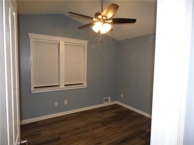 unfurnished room with dark hardwood / wood-style flooring, ceiling fan, and lofted ceiling