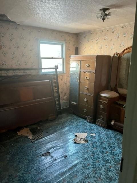 unfurnished bedroom featuring a textured ceiling