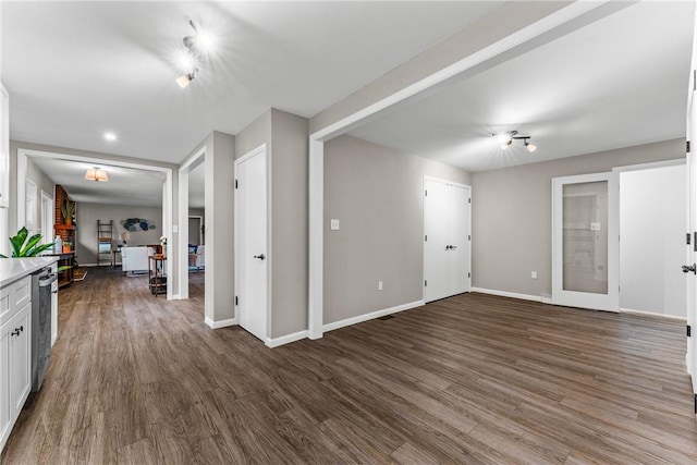 interior space with dark wood-type flooring