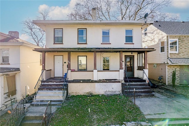 view of property with covered porch