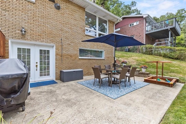 view of patio featuring grilling area and french doors