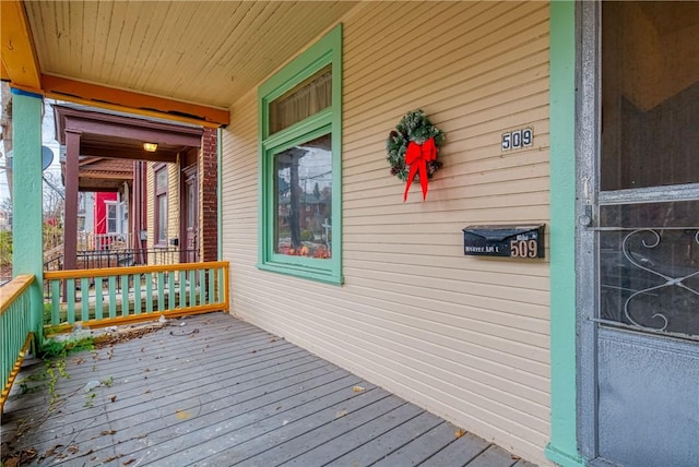 wooden deck featuring a porch