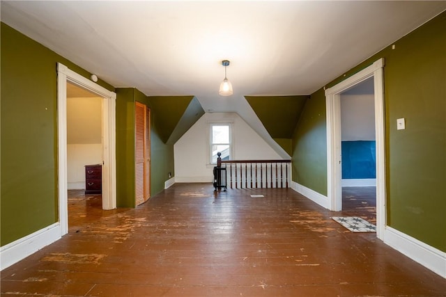 bonus room featuring dark hardwood / wood-style flooring