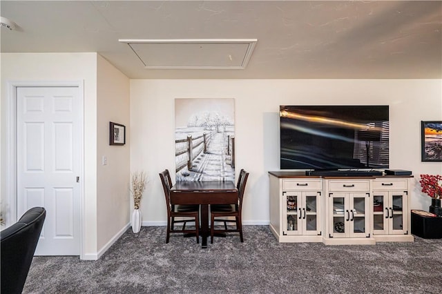 view of carpeted dining area