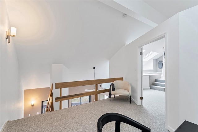 bonus room featuring carpet flooring and vaulted ceiling