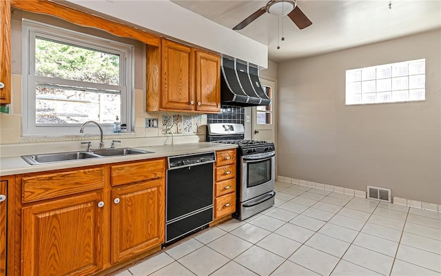 kitchen with backsplash, sink, black dishwasher, gas stove, and custom range hood