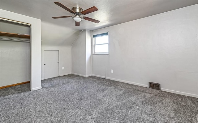 bonus room with carpet flooring, ceiling fan, and lofted ceiling