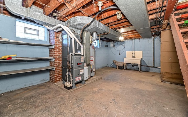 basement featuring heating unit, sink, and water heater