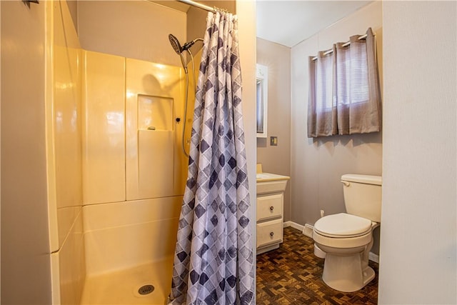 bathroom featuring a shower with curtain, parquet floors, and toilet