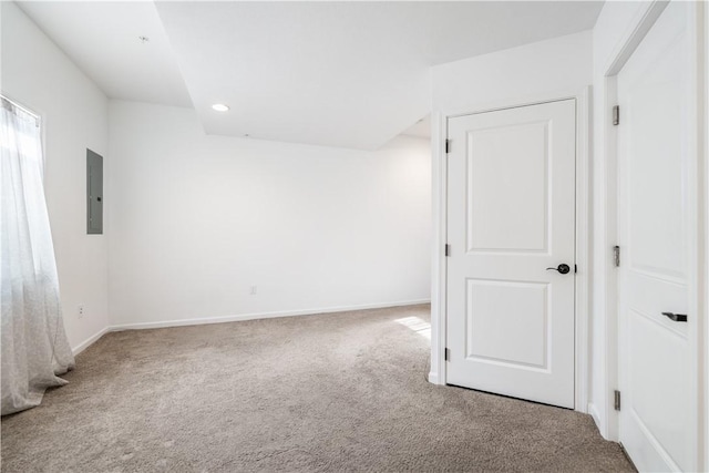 unfurnished room with carpet floors and electric panel