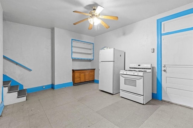 kitchen featuring white appliances and ceiling fan