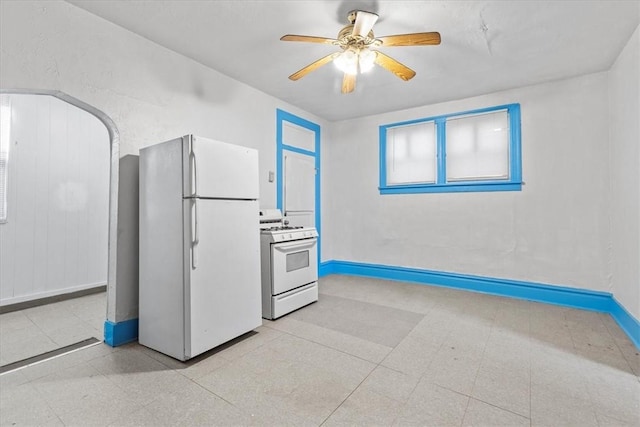 kitchen with ceiling fan and white appliances