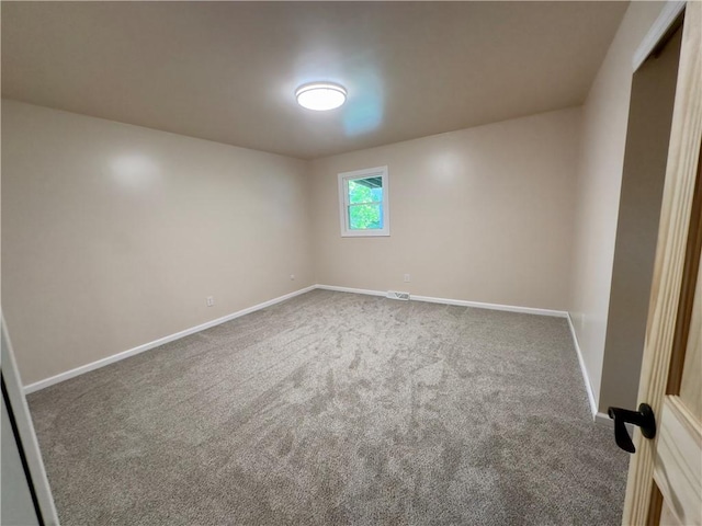 spare room with carpet flooring