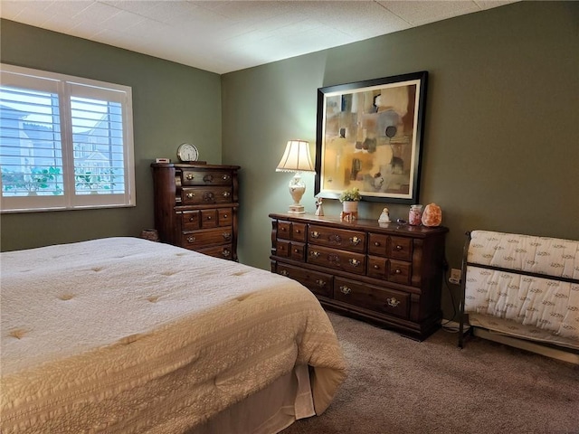 bedroom featuring carpet