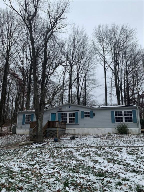 view of front of home with a deck