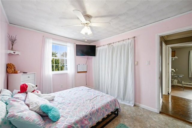 bedroom with baseboards and a ceiling fan