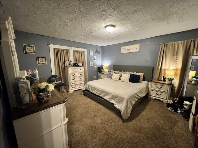 carpeted bedroom with a textured ceiling