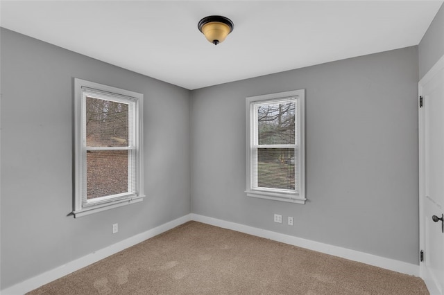 view of carpeted spare room