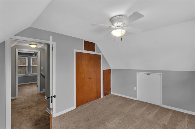 bonus room with carpet flooring, ceiling fan, and lofted ceiling