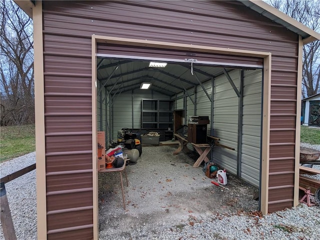 garage featuring a carport