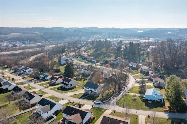 drone / aerial view featuring a mountain view