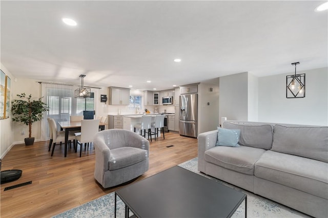 living room with light wood-type flooring