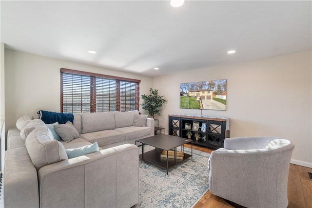 living room with light hardwood / wood-style flooring