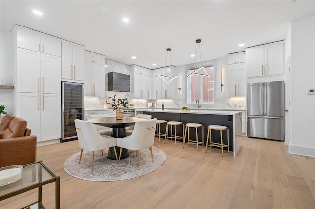 dining space featuring light wood-type flooring