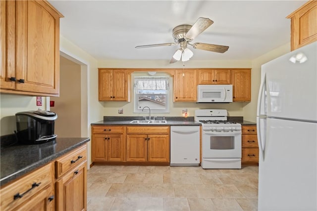 kitchen featuring ceiling fan, white appliances, and sink